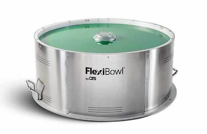 Schneider & Company - A large, round, metal industrial mixing bowl named "FlexiBowl" by ATS with a green liquid contents and a centered lid.